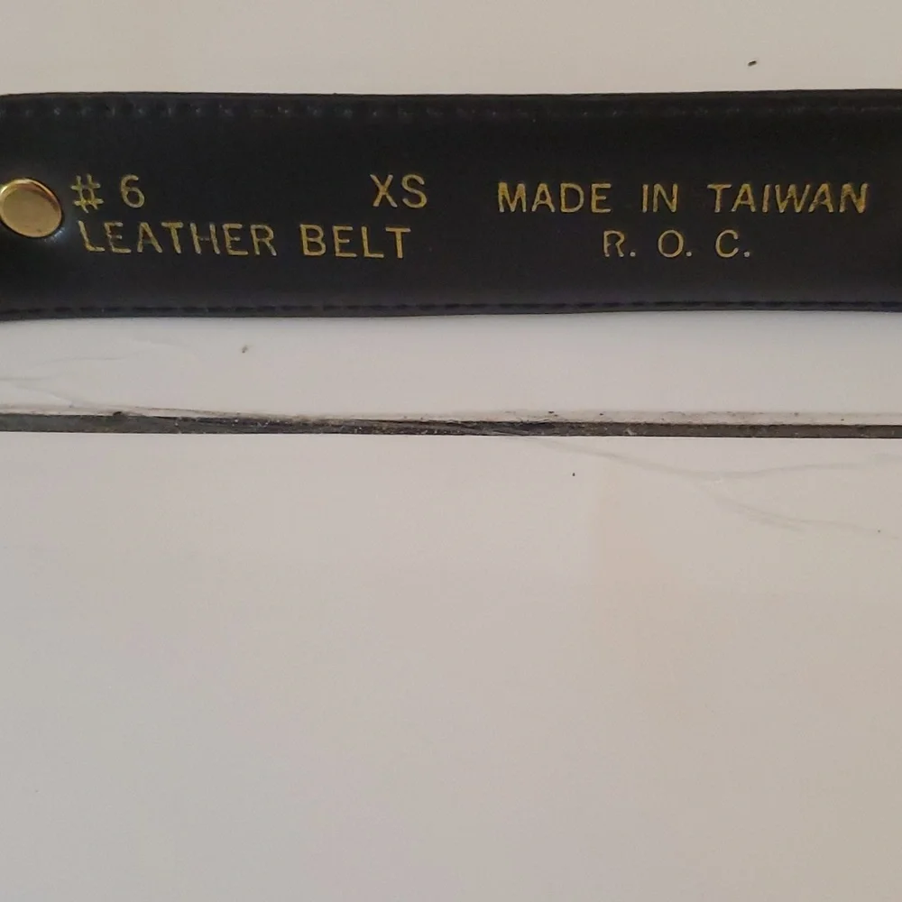 New without tags womens X black leather belt in size S, M & L